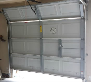 Why Does My Garage Door Close All The Way Then Open